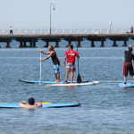 sup paddeln in St. Kilda Melbourne Australien
